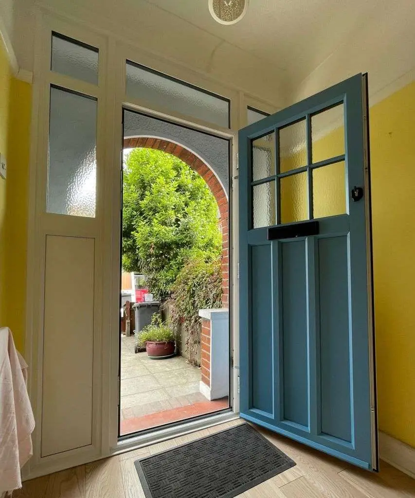 Pastel blue John Fredericks Plastics Ultimate PVC-u entrance door with top and sidelights