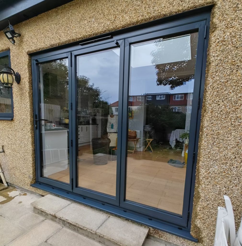 Exterior view of PVCu French doors installed in a Shirley home.